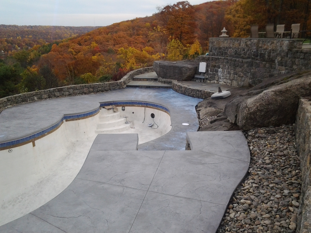 Swimming pool and stamped concrete project example 160